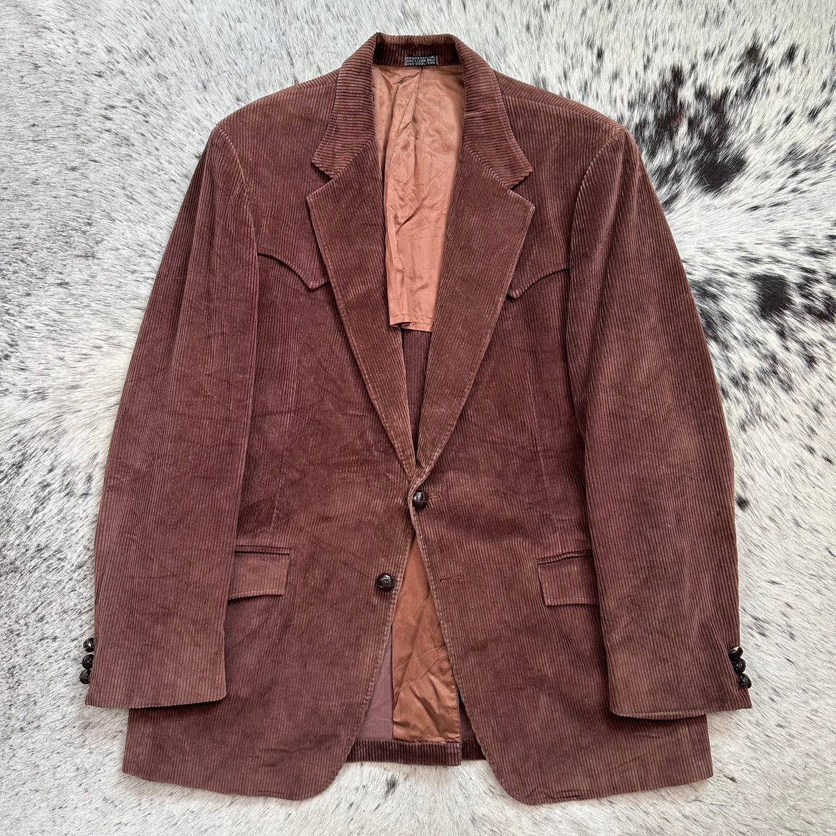 Western style brown corduroy sport coat with point yokes approx 42R by The Corral