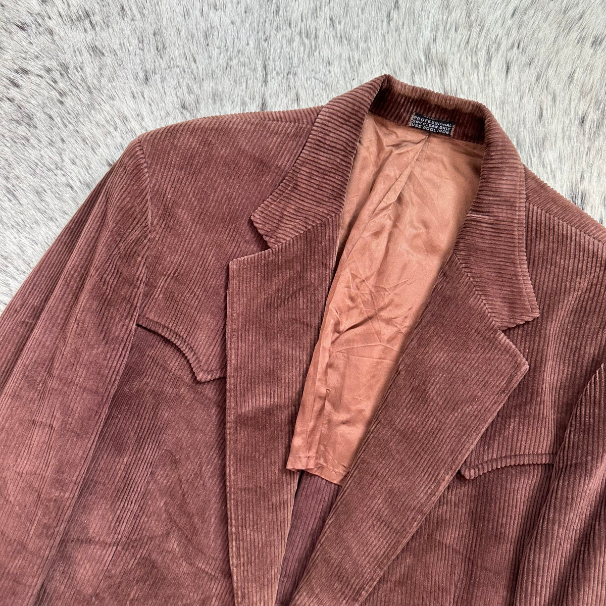 Western style brown corduroy sport coat with point yokes approx 42R by The Corral